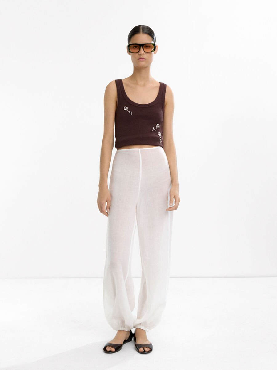 Top with beaded flowers