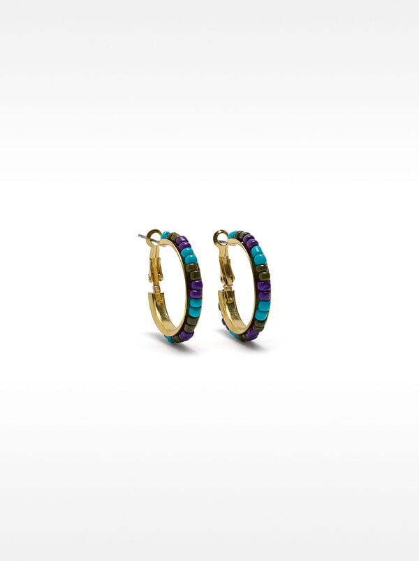 Ohrringe mit Ringen und Perlen