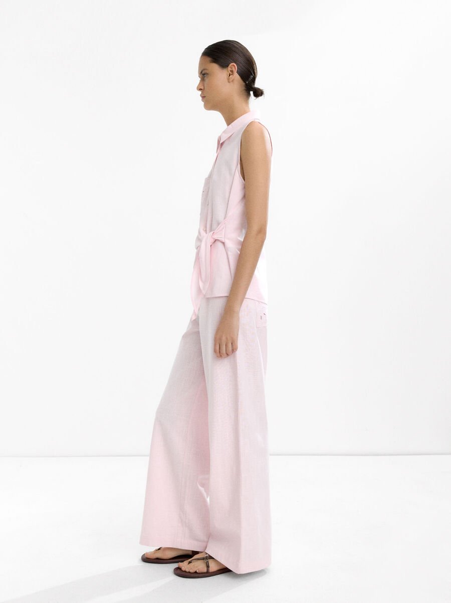 Top with embroidery and knot