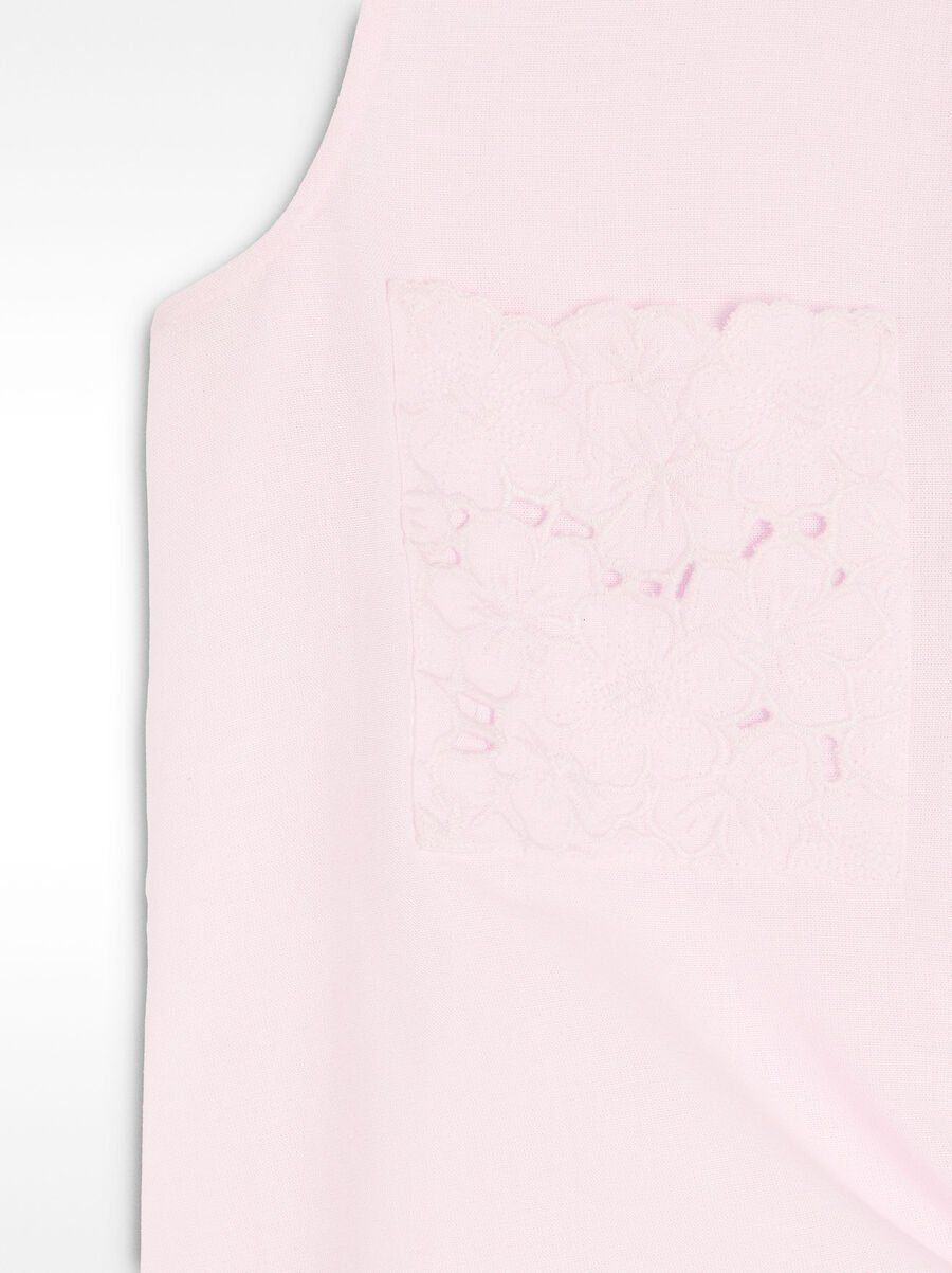 Top with embroidery and knot
