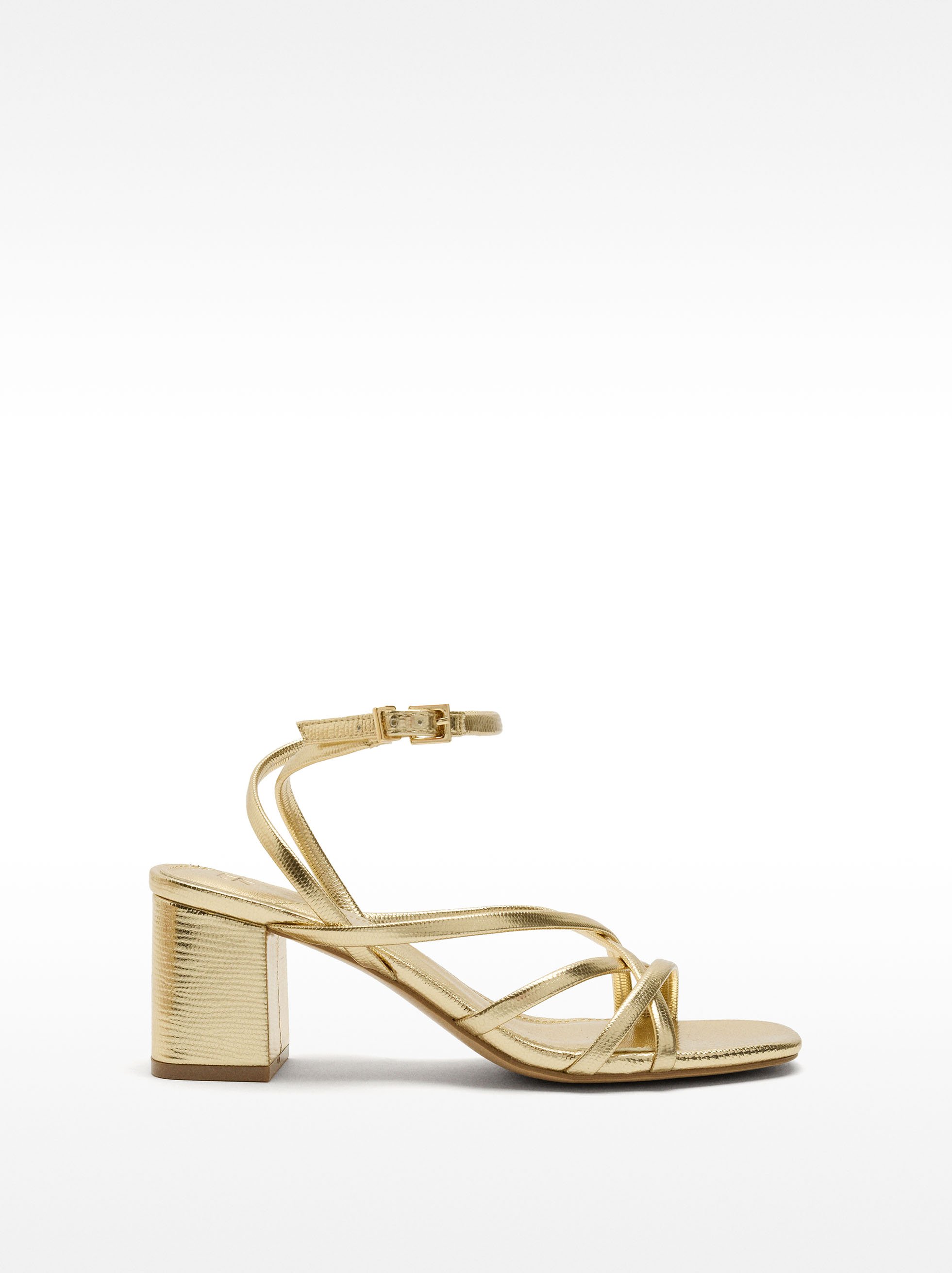 Metallic heeled sandals with crossed straps